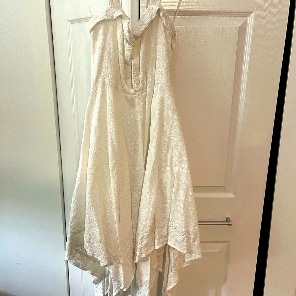 White beauty! Asymmetrical at the bottom Halter neck